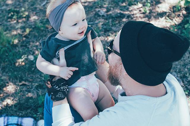 Father playing with his baby girl